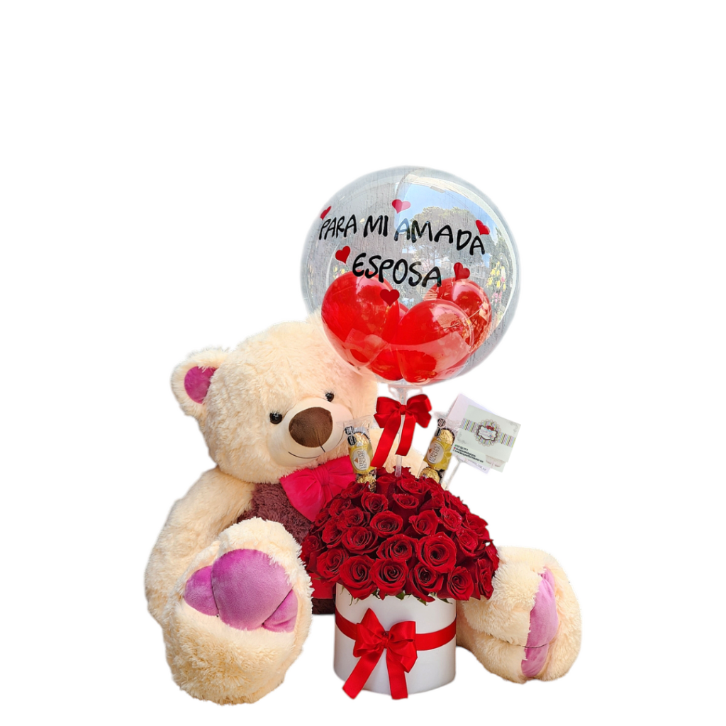 Cilindro decorativo con rosas rojas, peluches, chocolates y un globo personalizado, ideal para regalos especiales.