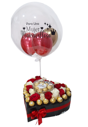 Caja en forma de corazón con rosas, chocolates Ferrero Rocher y un globo con mensaje "Para una mujer maravillosa.