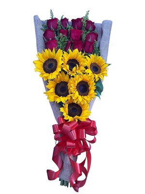 Rosas rojas y girasoles en un ramo