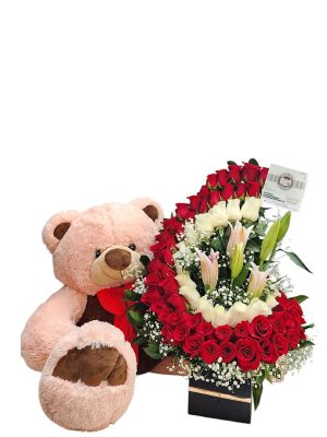 Arreglo con rosas lirios y peluches